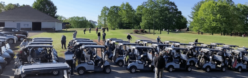 View of golf course carts during outing 
